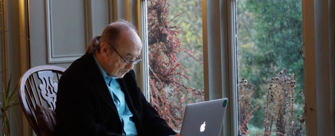 Older man using a laptop