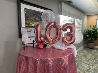 Balloons depicting 103